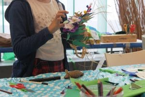 Making Mazey Day headdresses at The Exchange