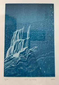 blue and white print of a waterfall