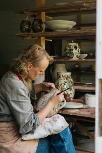 Freyja Lee working on ceramics