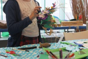 Making Mazey Day headdresses at The Exchange