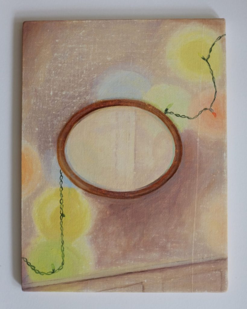 Beth Kaye - Glowing is a painting with a wooden oval frame on a textured background, featuring blurred yellow circles and a looping green string, creating a soft, dreamy atmosphere.