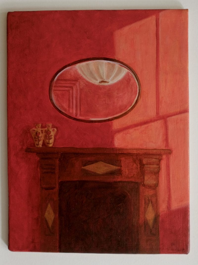 Just US by Beth Kaye is a painting of a red room featuring a fireplace with decorative moulding, two vases on the mantelpiece, and a round mirror reflecting light and window shadows.