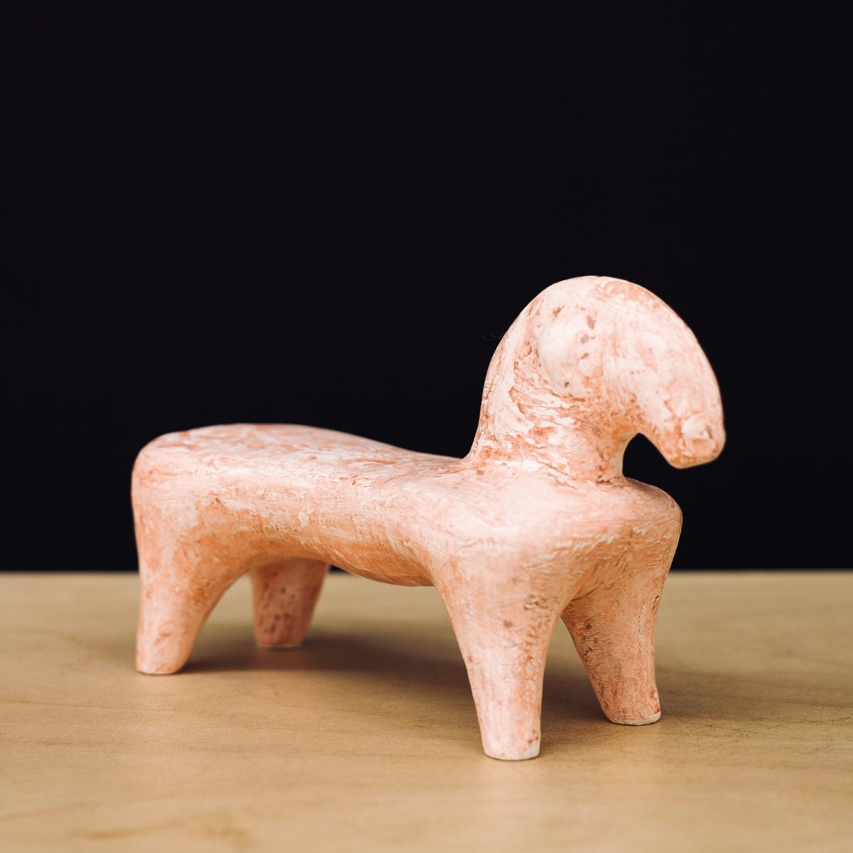 Pink Plaster Sculpture of a Horse